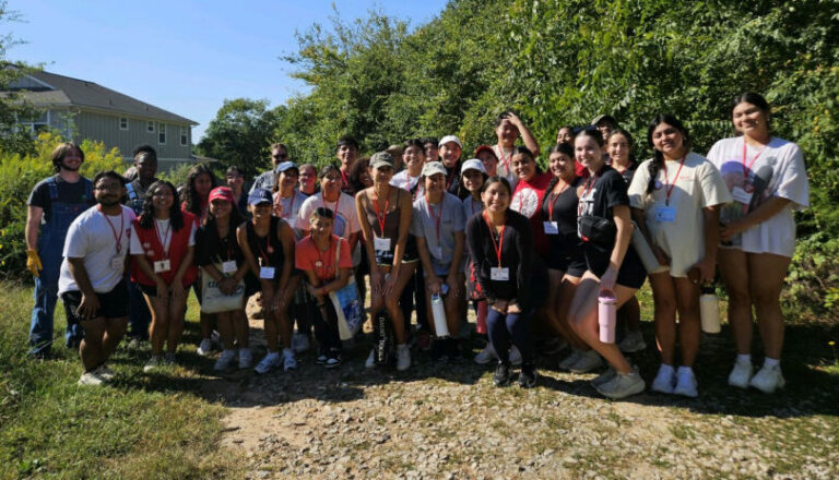 Volunteers removed invasive vines from trees at Athens Land Trust, led by Service Ambassador Wendy Trejo and Co-Site Lead Roberto Rios.